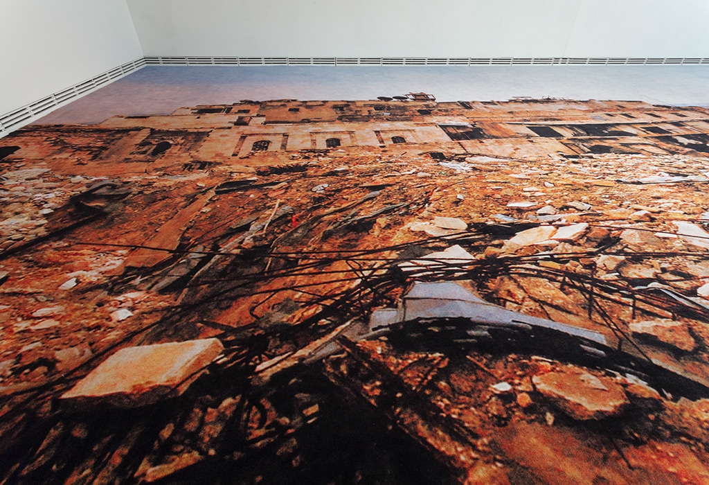 view of left side of printed carpet on art gallery floor